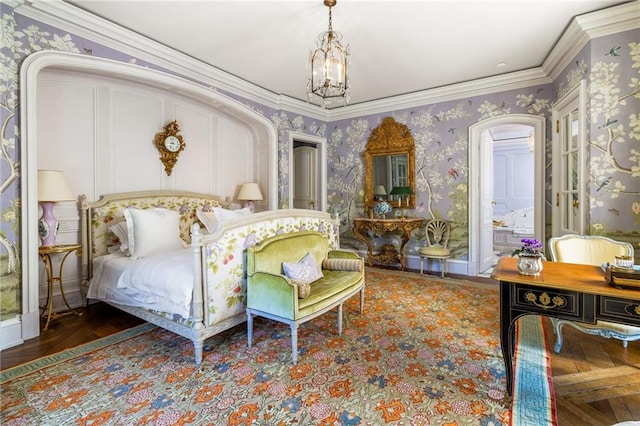 bedroom featuring hardwood / wood-style flooring, a notable chandelier, and ornamental molding