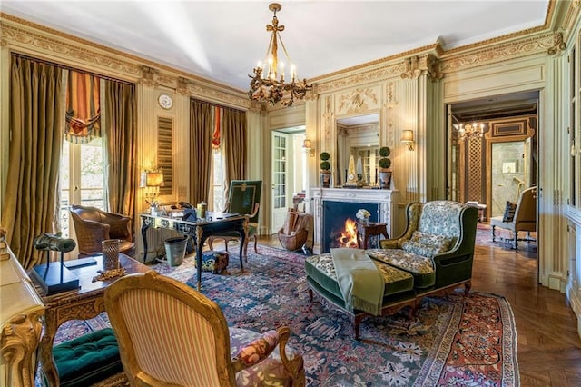 sitting room featuring french doors, parquet floors, crown molding, and a chandelier