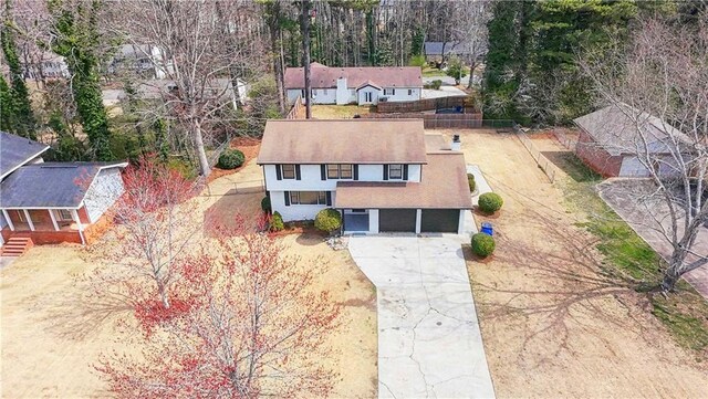 2167 Cedar Dr, Lawrenceville, GA 30043 - kitchen featuring visible vents, light countertops, stainless steel electric range, white cabinets, and a sink