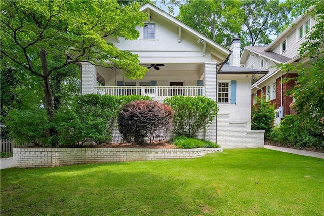 626 Elmwood Dr NE, Atlanta, GA 30306 - view of front of property featuring brick siding, a front lawn, and a ceiling fan
