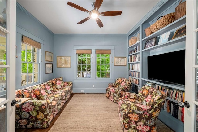 626 Elmwood Dr NE, Atlanta, GA 30306 - living area with plenty of natural light, ornamental molding, and ceiling fan
