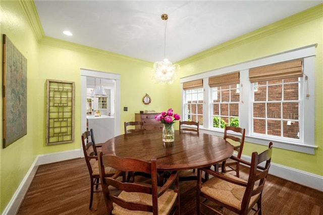 626 Elmwood Dr NE, Atlanta, GA 30306 - dining space featuring dark wood finished floors, crown molding, and a chandelier
