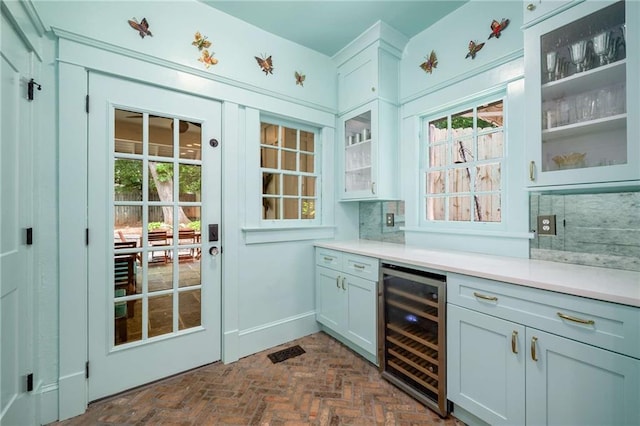 626 Elmwood Dr NE, Atlanta, GA 30306 - bar area with wine cooler and brick flooring