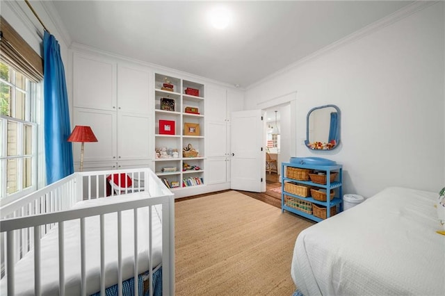 626 Elmwood Dr NE, Atlanta, GA 30306 - bedroom with ornamental molding and wood finished floors
