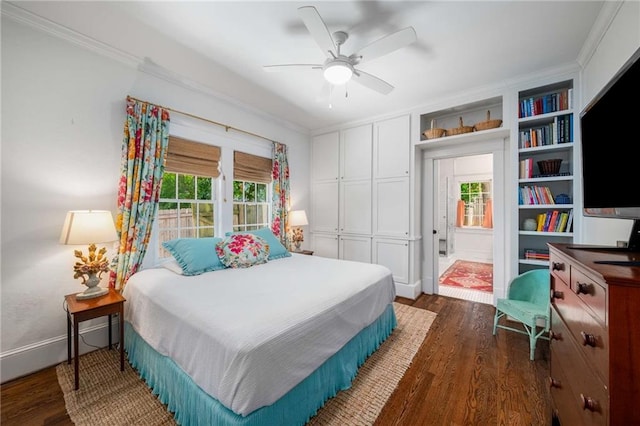 626 Elmwood Dr NE, Atlanta, GA 30306 - bedroom featuring ornamental molding, dark wood finished floors, a closet, and a ceiling fan