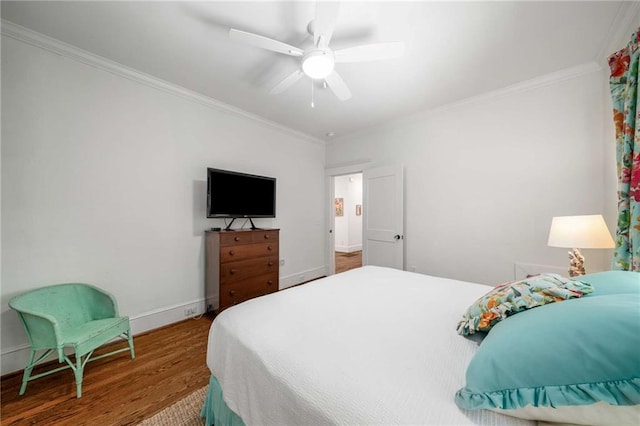 626 Elmwood Dr NE, Atlanta, GA 30306 - bedroom with ornamental molding, wood finished floors, and ceiling fan