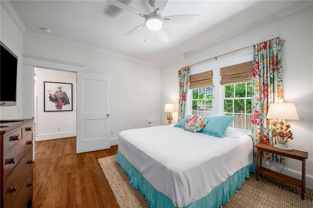 626 Elmwood Dr NE, Atlanta, GA 30306 - bedroom featuring crown molding, wood finished floors, and ceiling fan