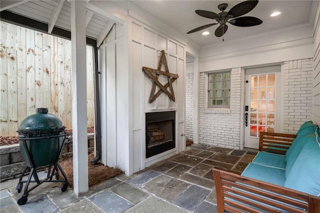 626 Elmwood Dr NE, Atlanta, GA 30306 - view of patio / terrace with a fireplace, area for grilling, and ceiling fan