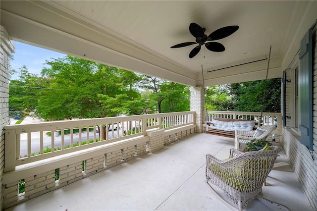 626 Elmwood Dr NE, Atlanta, GA 30306 - view of patio / terrace with ceiling fan and view of wooded area