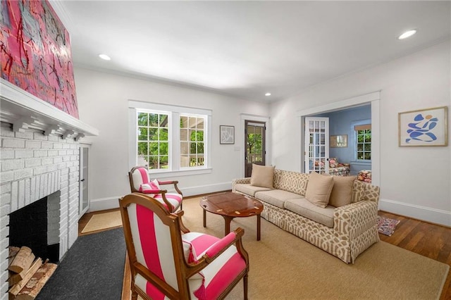 626 Elmwood Dr NE, Atlanta, GA 30306 - living area featuring wood finished floors, a fireplace, and recessed lighting