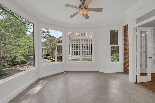 2010 Riverside Rd, Roswell, GA 30076 - unfurnished sunroom with tile patterned floors, ornamental molding, and baseboards