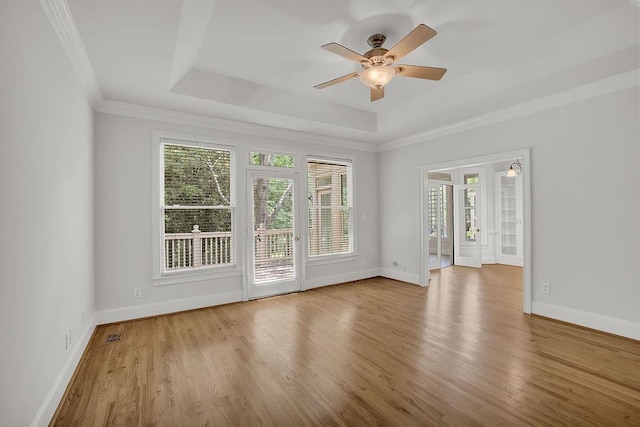 2010 Riverside Rd, Roswell, GA 30076 - unfurnished room with plenty of natural light, french doors, ceiling fan, wood finished floors, and ornamental molding