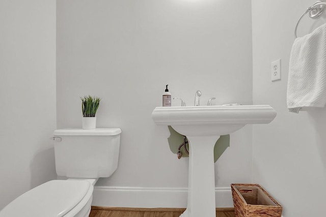 2010 Riverside Rd, Roswell, GA 30076 - bathroom featuring toilet, wood finished floors, and baseboards