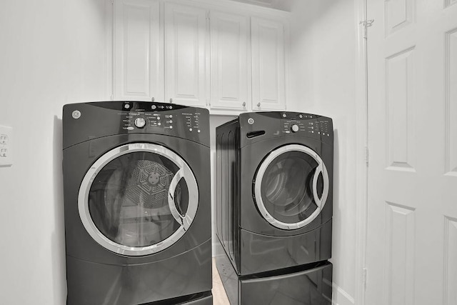 2010 Riverside Rd, Roswell, GA 30076 - laundry area with separate washer and dryer, cabinet space, and tile patterned flooring