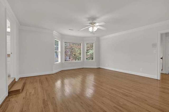 2010 Riverside Rd, Roswell, GA 30076 - spare room with ceiling fan, baseboards, light wood-type flooring, and ornamental molding