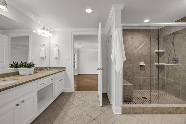 2010 Riverside Rd, Roswell, GA 30076 - full bath with double vanity, tile patterned floors, a shower stall, recessed lighting, and ornamental molding