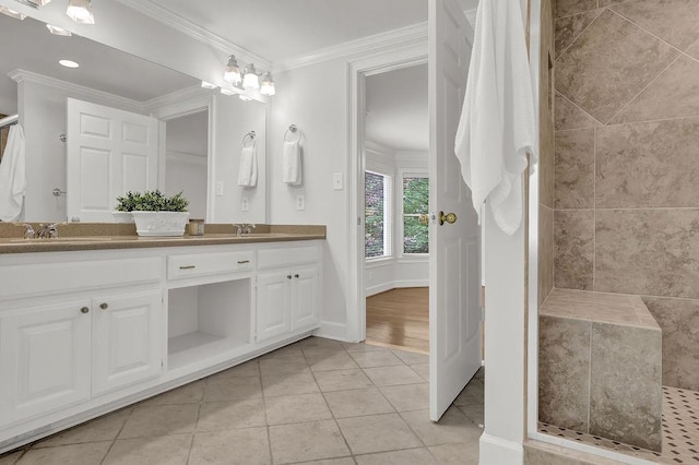 2010 Riverside Rd, Roswell, GA 30076 - bathroom featuring double vanity, tiled shower, ornamental molding, tile patterned floors, and recessed lighting