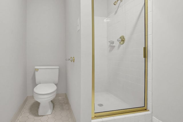 2010 Riverside Rd, Roswell, GA 30076 - bathroom with a stall shower, toilet, tile patterned floors, and baseboards