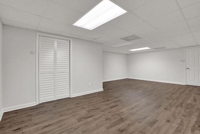 2010 Riverside Rd, Roswell, GA 30076 - finished below grade area with dark wood-style floors, a drop ceiling, and baseboards