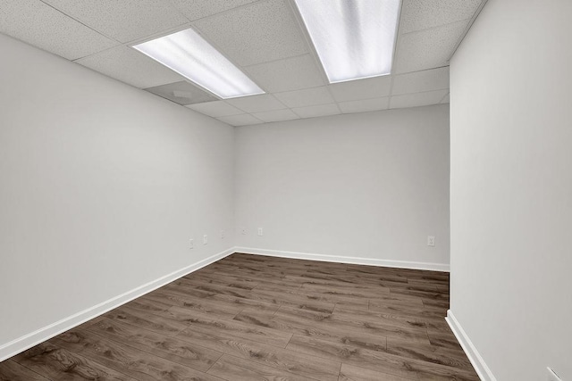 2010 Riverside Rd, Roswell, GA 30076 - spare room with a paneled ceiling, dark wood finished floors, and baseboards