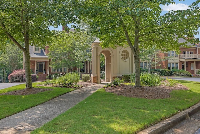 2010 Riverside Rd, Roswell, GA 30076 - view of property hidden behind natural elements featuring a front yard and brick siding