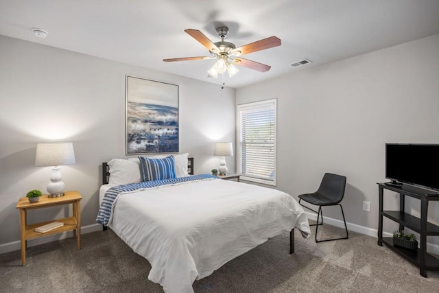 bedroom with visible vents, baseboards, carpet, and a ceiling fan