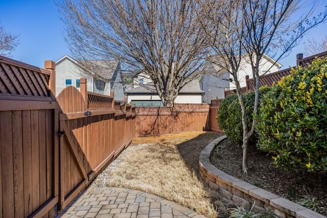 view of yard with a gate and fence