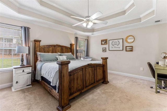 102 Blackstone Ct, Kathleen, GA 31047 - bedroom featuring a tray ceiling, ornamental molding, multiple windows, light colored carpet, and baseboards