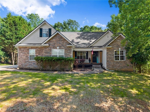 5995 Wellington Ave, Gainesville, GA 30506 - view of front of house with stone siding, a front yard, and covered porch
