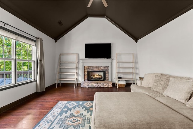 5995 Wellington Ave, Gainesville, GA 30506 - living area with wood finished floors, lofted ceiling, a fireplace, a ceiling fan, and baseboards