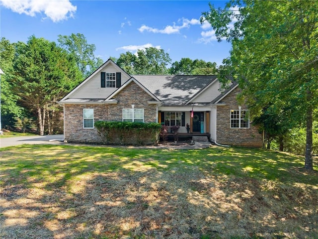 5995 Wellington Ave, Gainesville, GA 30506 - view of front facade featuring stone siding and a front lawn
