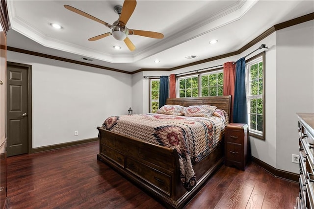 5995 Wellington Ave, Gainesville, GA 30506 - bedroom featuring dark wood-style floors, crown molding, baseboards, a tray ceiling, and a ceiling fan