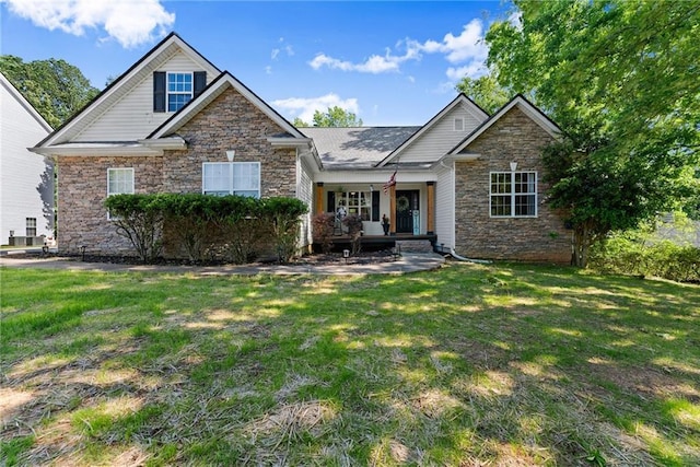 5995 Wellington Ave, Gainesville, GA 30506 - view of front facade featuring stone siding, a porch, and a front yard
