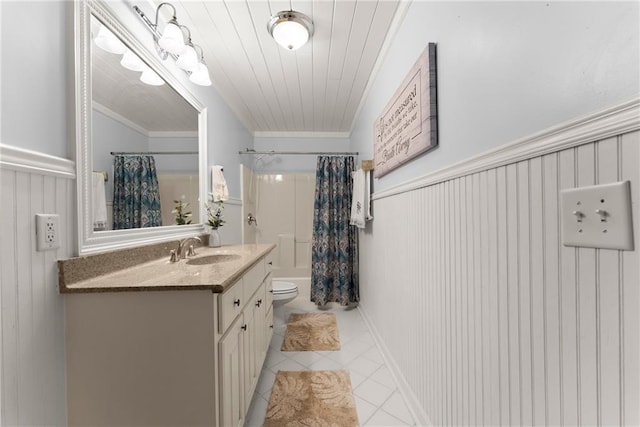 5995 Wellington Ave, Gainesville, GA 30506 - full bath featuring vanity, toilet, tile patterned floors, shower / bathtub combination with curtain, and ornamental molding