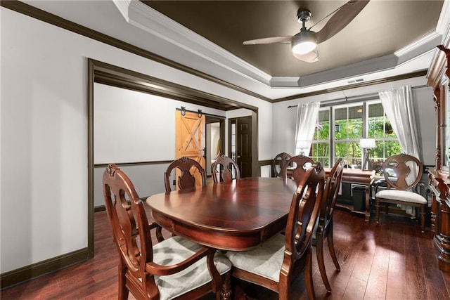 5995 Wellington Ave, Gainesville, GA 30506 - dining area with a raised ceiling, a barn door, a ceiling fan, dark wood finished floors, and crown molding