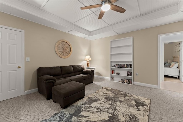 5995 Wellington Ave, Gainesville, GA 30506 - living room with carpet floors, a ceiling fan, baseboards, and built in shelves