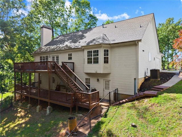 5995 Wellington Ave, Gainesville, GA 30506 - rear view of property featuring a deck, a chimney, central AC, stairway, and a yard