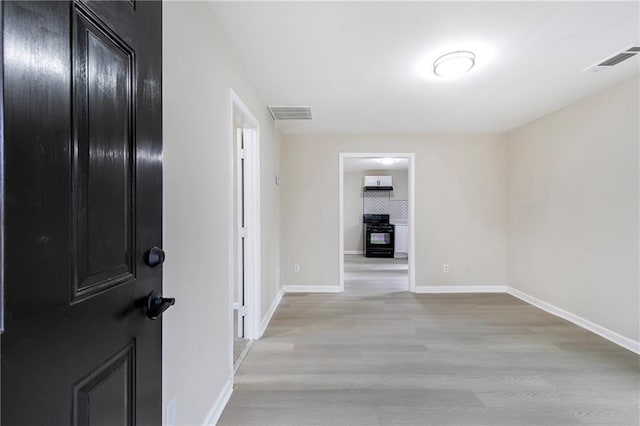 hall featuring light hardwood / wood-style flooring