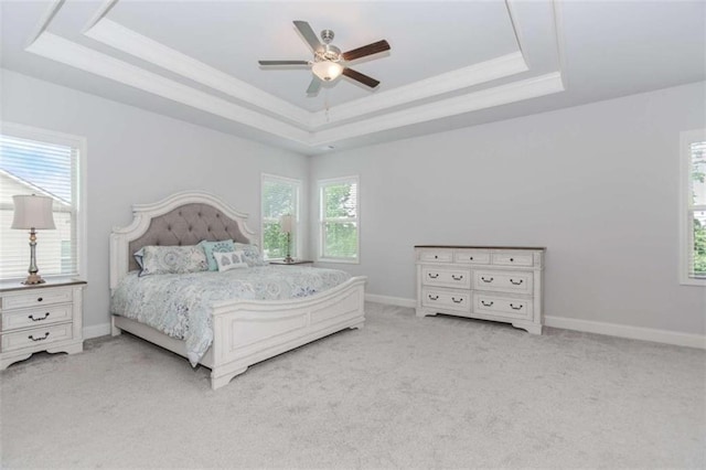 72 Whistling Dr, Jefferson, GA 30549 - carpeted bedroom with a tray ceiling, multiple windows, baseboards, and ceiling fan