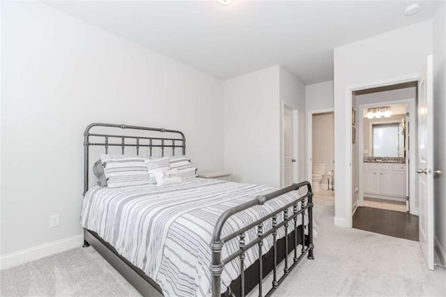 72 Whistling Dr, Jefferson, GA 30549 - carpeted bedroom featuring baseboards and connected bathroom