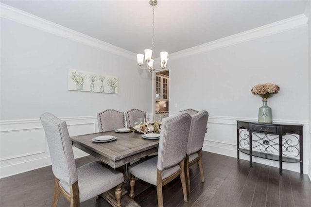 72 Whistling Dr, Jefferson, GA 30549 - dining space with ornamental molding, a chandelier, a decorative wall, dark wood finished floors, and a wainscoted wall