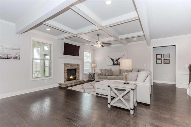 72 Whistling Dr, Jefferson, GA 30549 - living room featuring beam ceiling, wood finished floors, baseboards, a fireplace, and ceiling fan