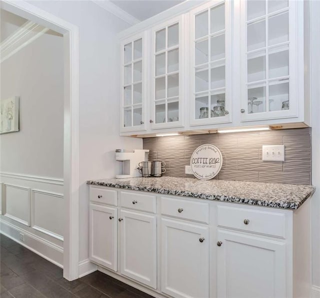 72 Whistling Dr, Jefferson, GA 30549 - bar featuring decorative backsplash, crown molding, and a wainscoted wall