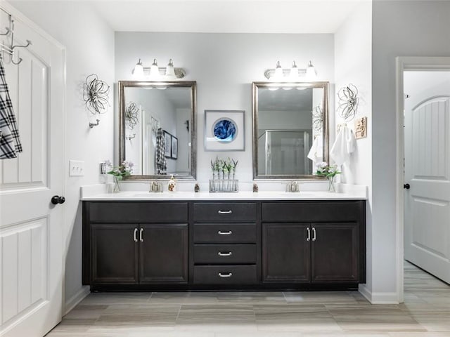 bathroom with vanity and walk in shower