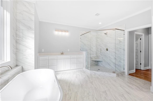 bathroom with vanity, crown molding, and shower with separate bathtub