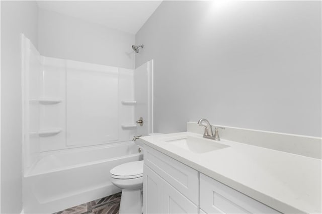 full bathroom featuring toilet, vanity, and shower / washtub combination