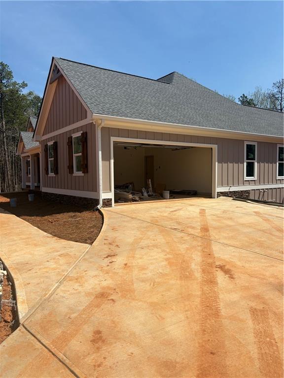 view of property's community with a lawn