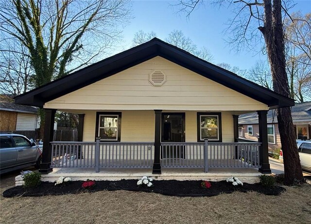 bungalow-style home with a porch