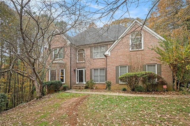 view of front facade featuring a front yard