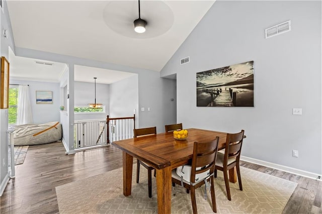 115 Donna Dr, Dawsonville, GA 30534 - dining room with wood finished floors, a ceiling fan, and high vaulted ceiling